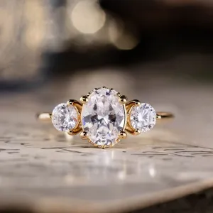 The Wren - Oval Diamond Three Stone Engagement Ring with Round Diamond Accents