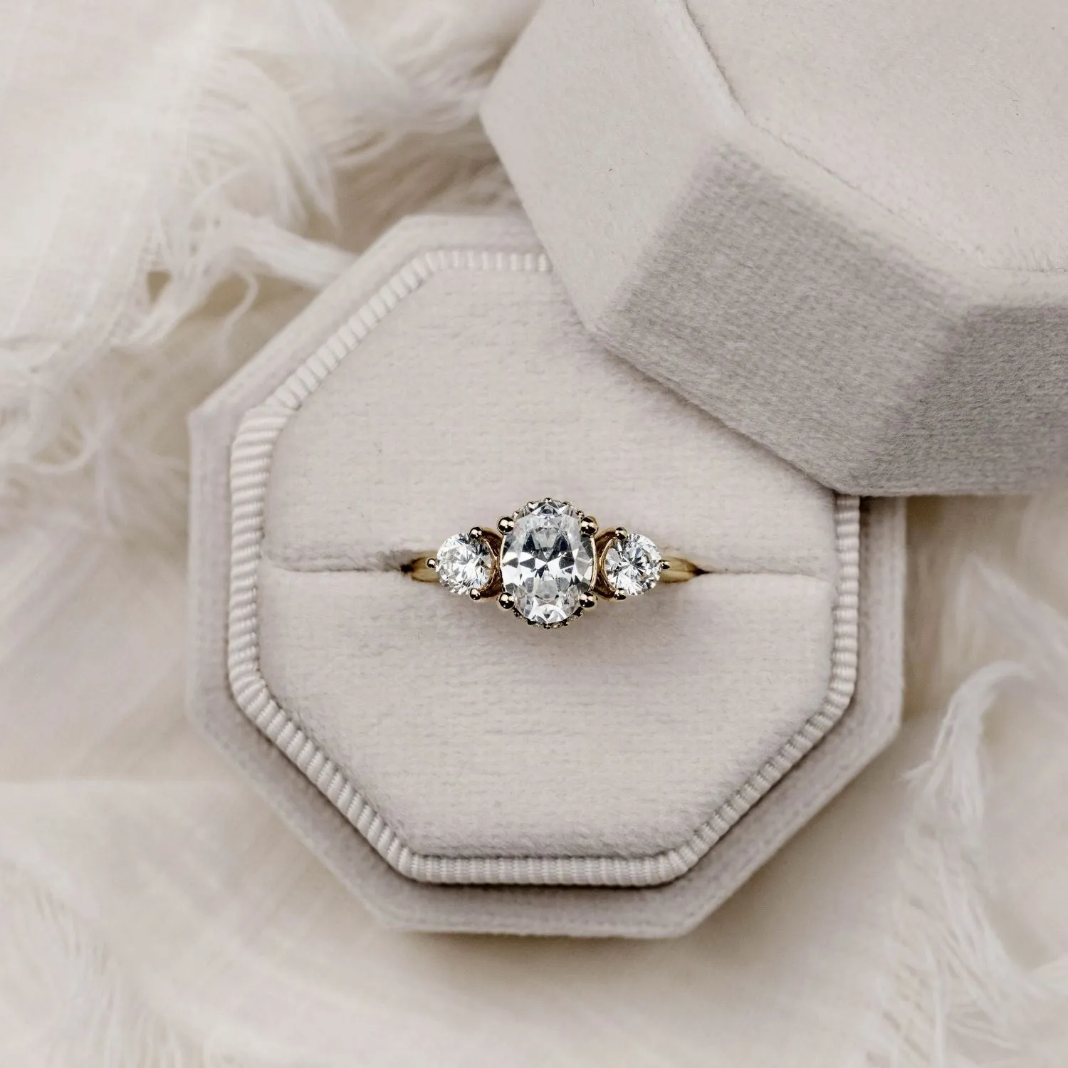 The Wren - Oval Diamond Three Stone Engagement Ring with Round Diamond Accents