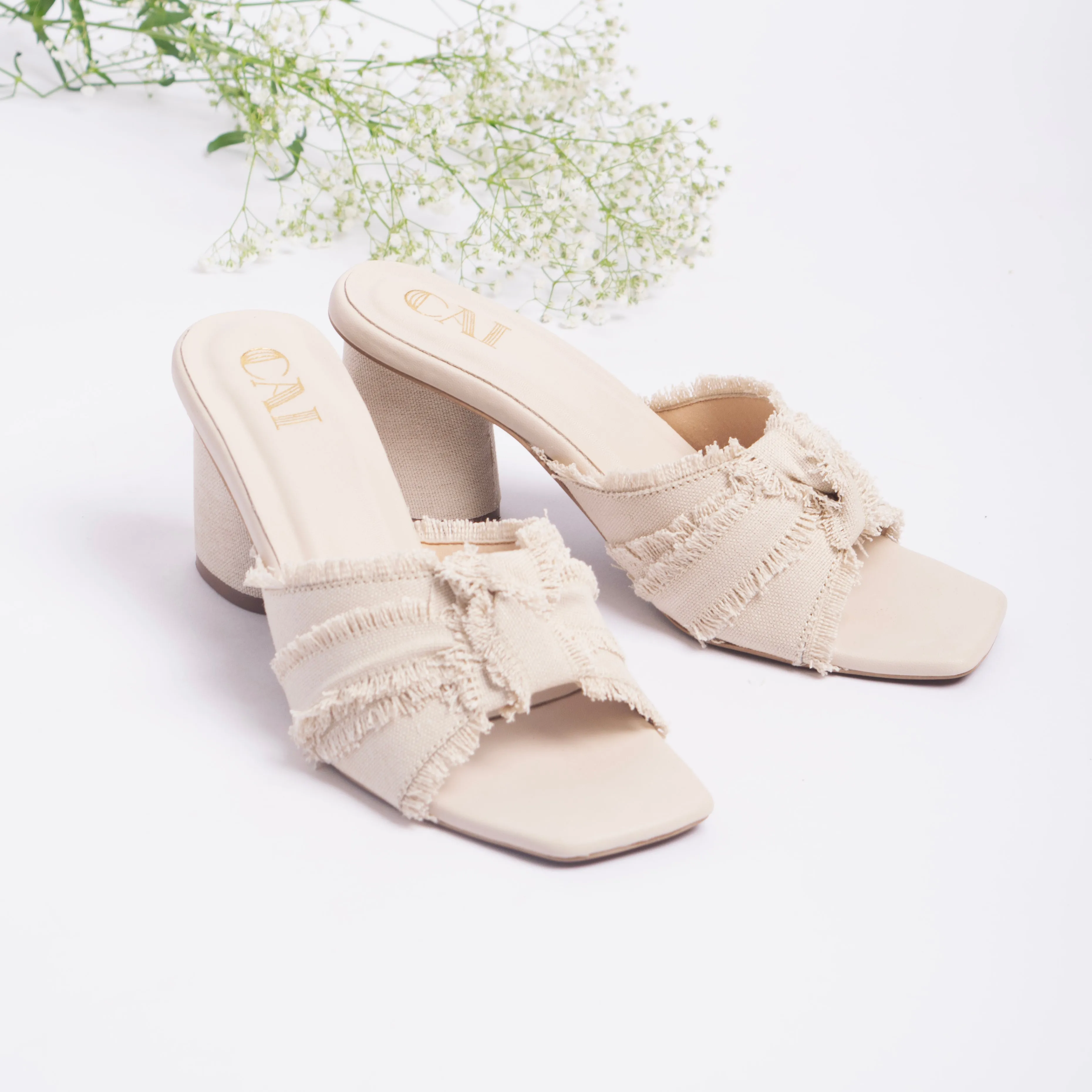 White Ruffled Heels