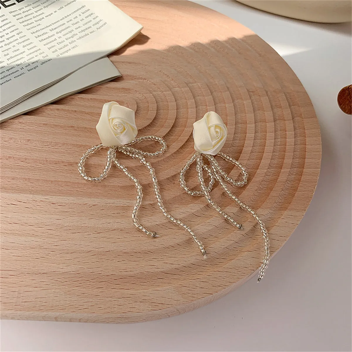White Textile & Acrylic Rosette Beaded Tassel Drop Earrings