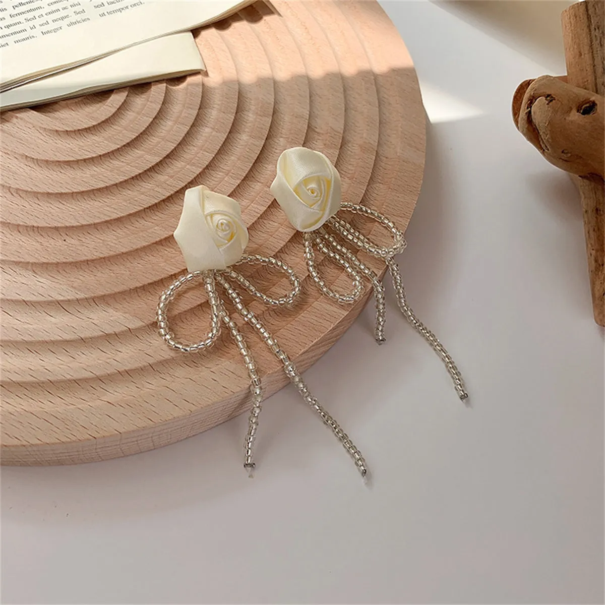 White Textile & Acrylic Rosette Beaded Tassel Drop Earrings