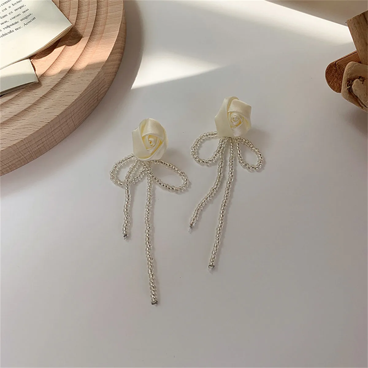 White Textile & Acrylic Rosette Beaded Tassel Drop Earrings
