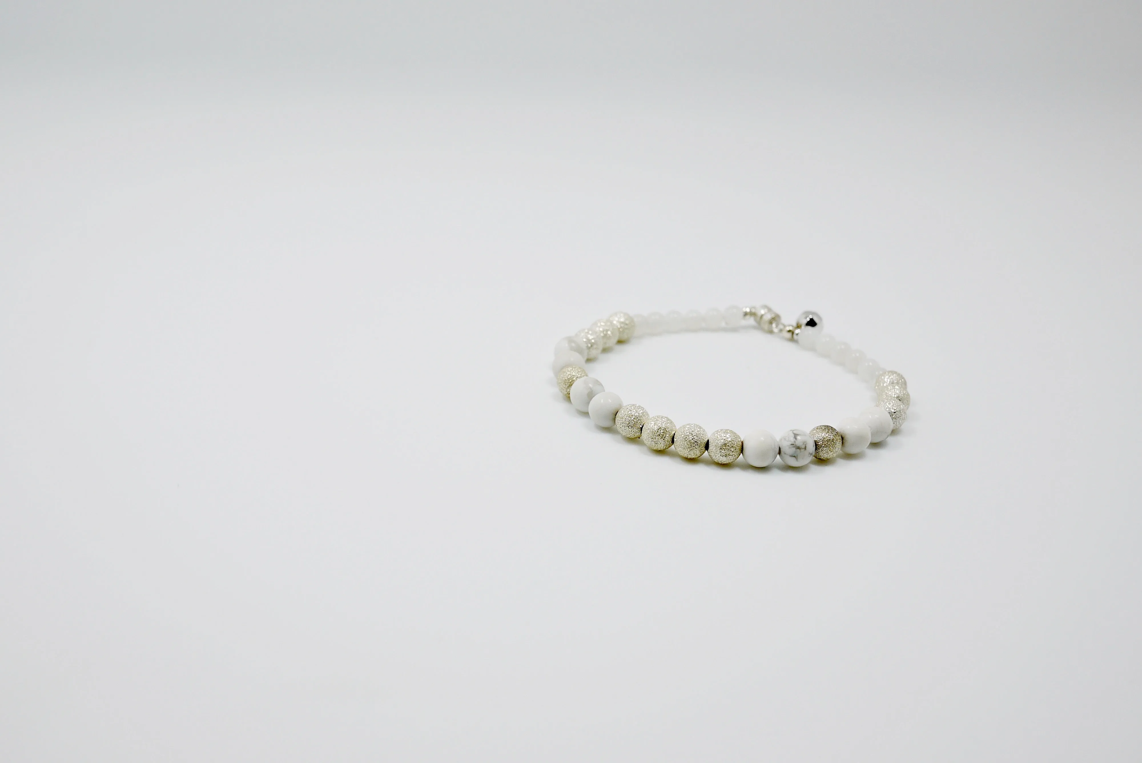 Women's Howlite, Moonstone, and Stardust Silver Bead Bracelet