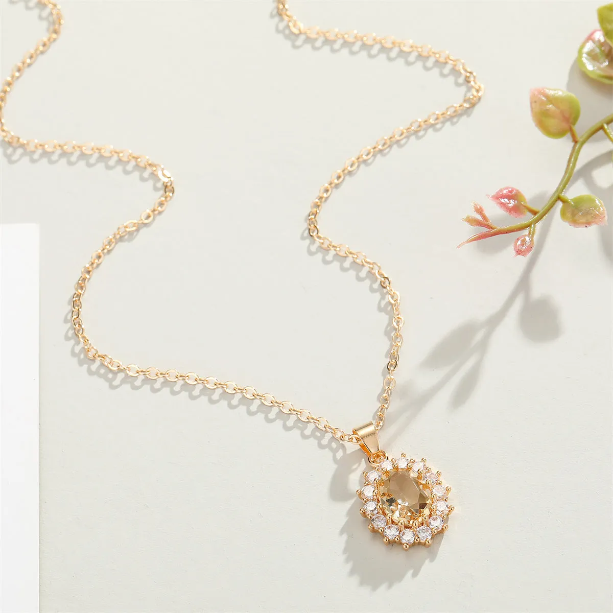 Yellow Crystal & Cubic Zirconia Oval-Cut Halo Pendant Necklace