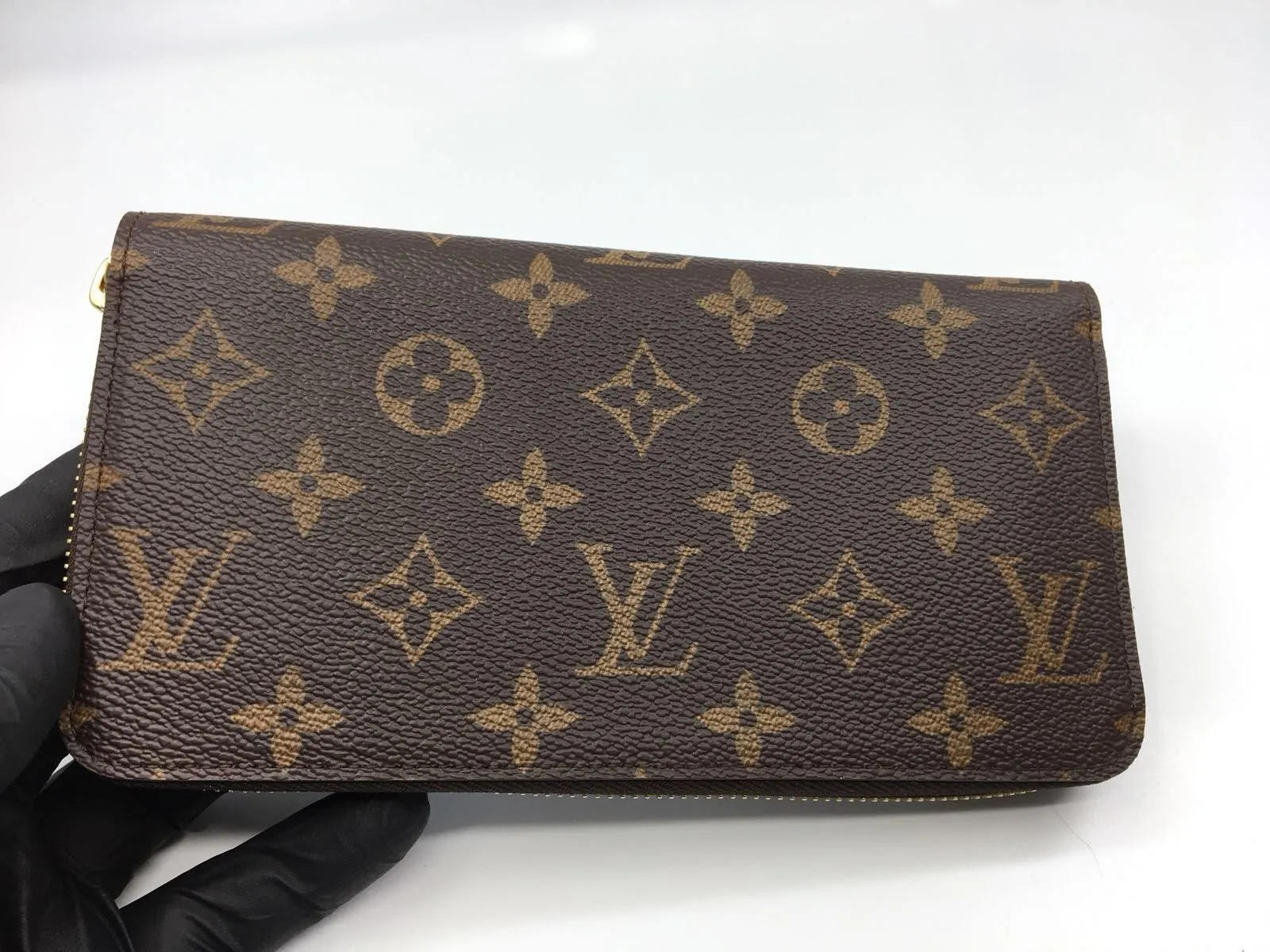 Zippy Wallet Monogram Canvas Red Lining