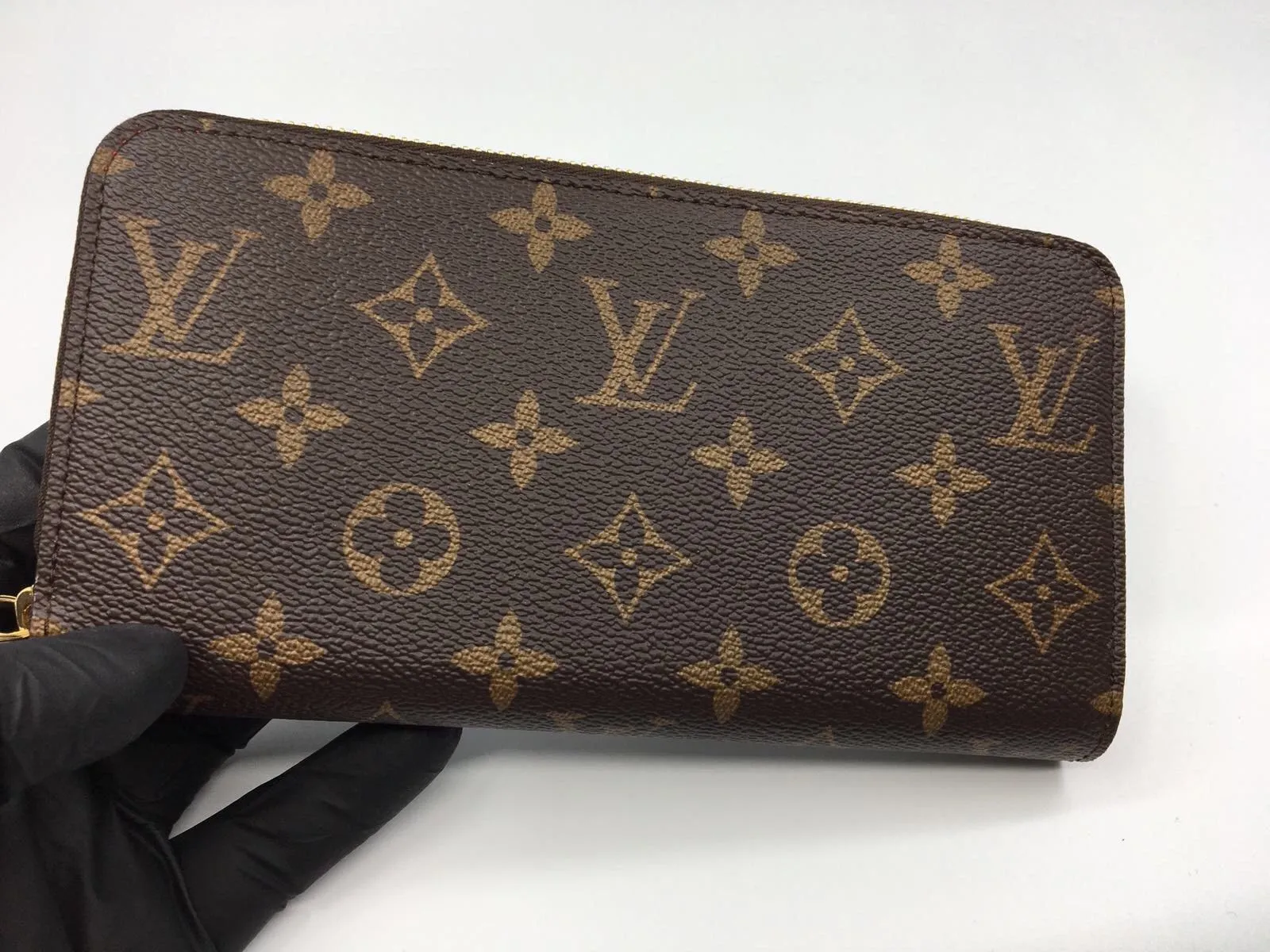 Zippy Wallet Monogram Canvas Red Lining